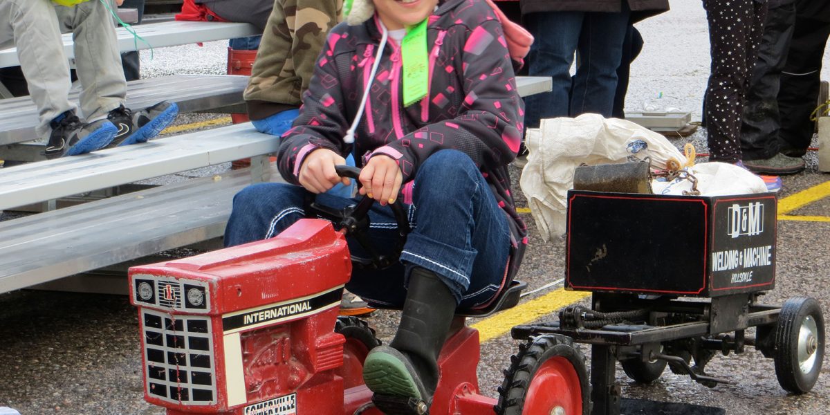 children's pedal tractor pull at Elmvale Fall Fair